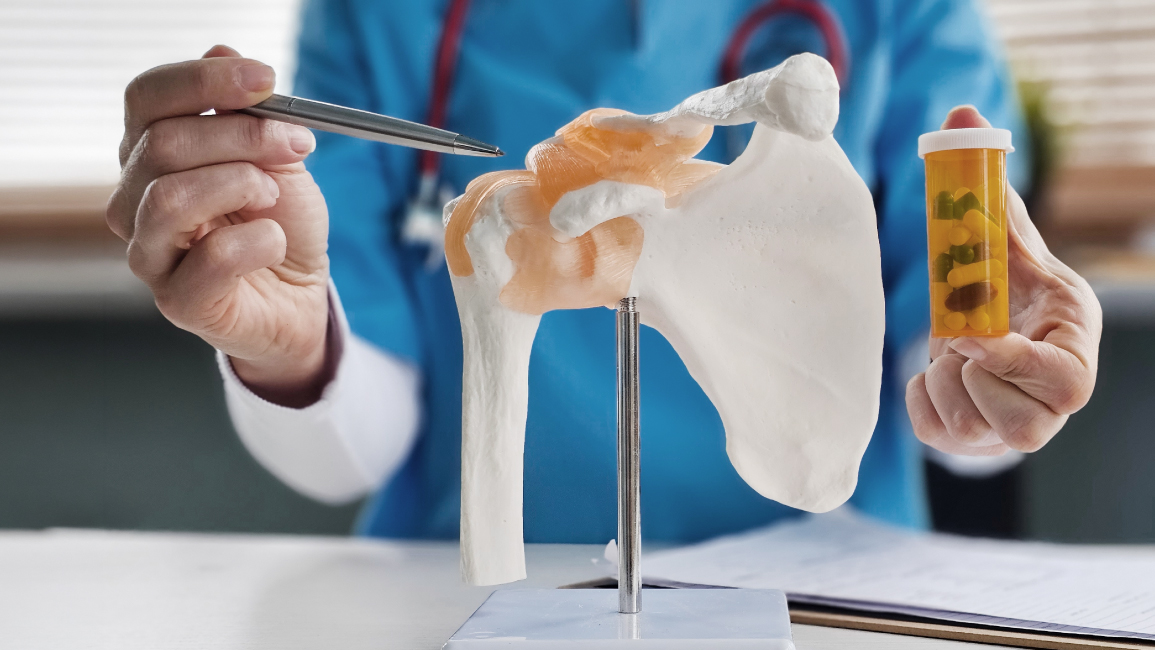 Orthopedic doctor in Bangkok explaining rotator cuff surgery and recovery plan to a patient