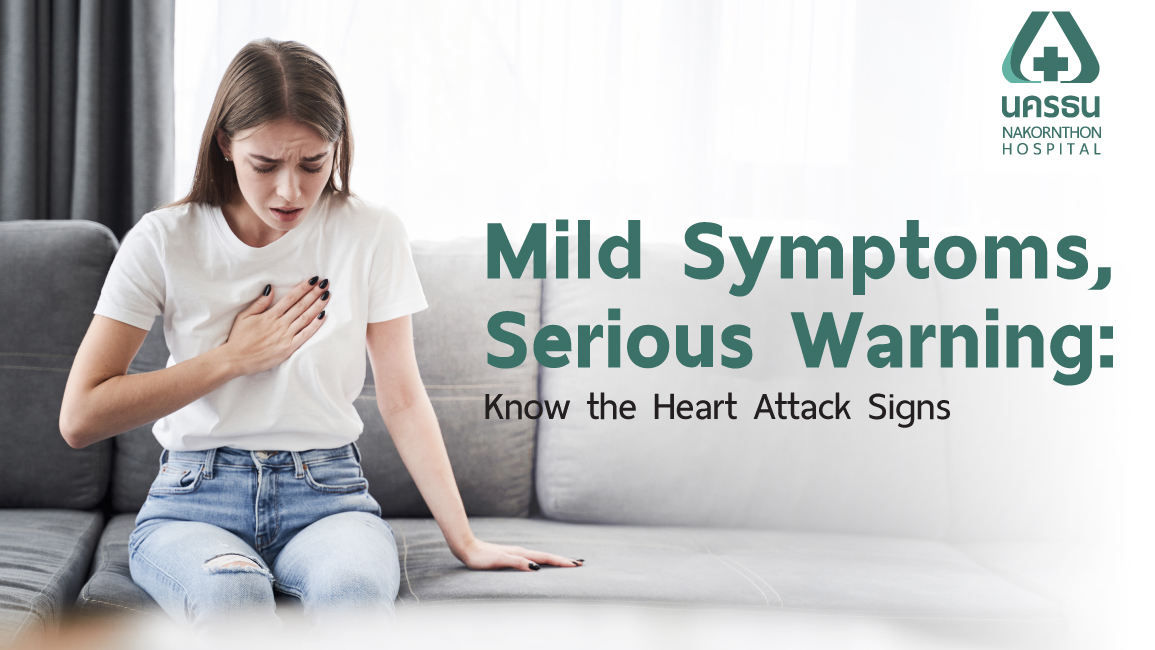 Adult experiencing subtle silent heart attack symptoms at home and reaching for her chest